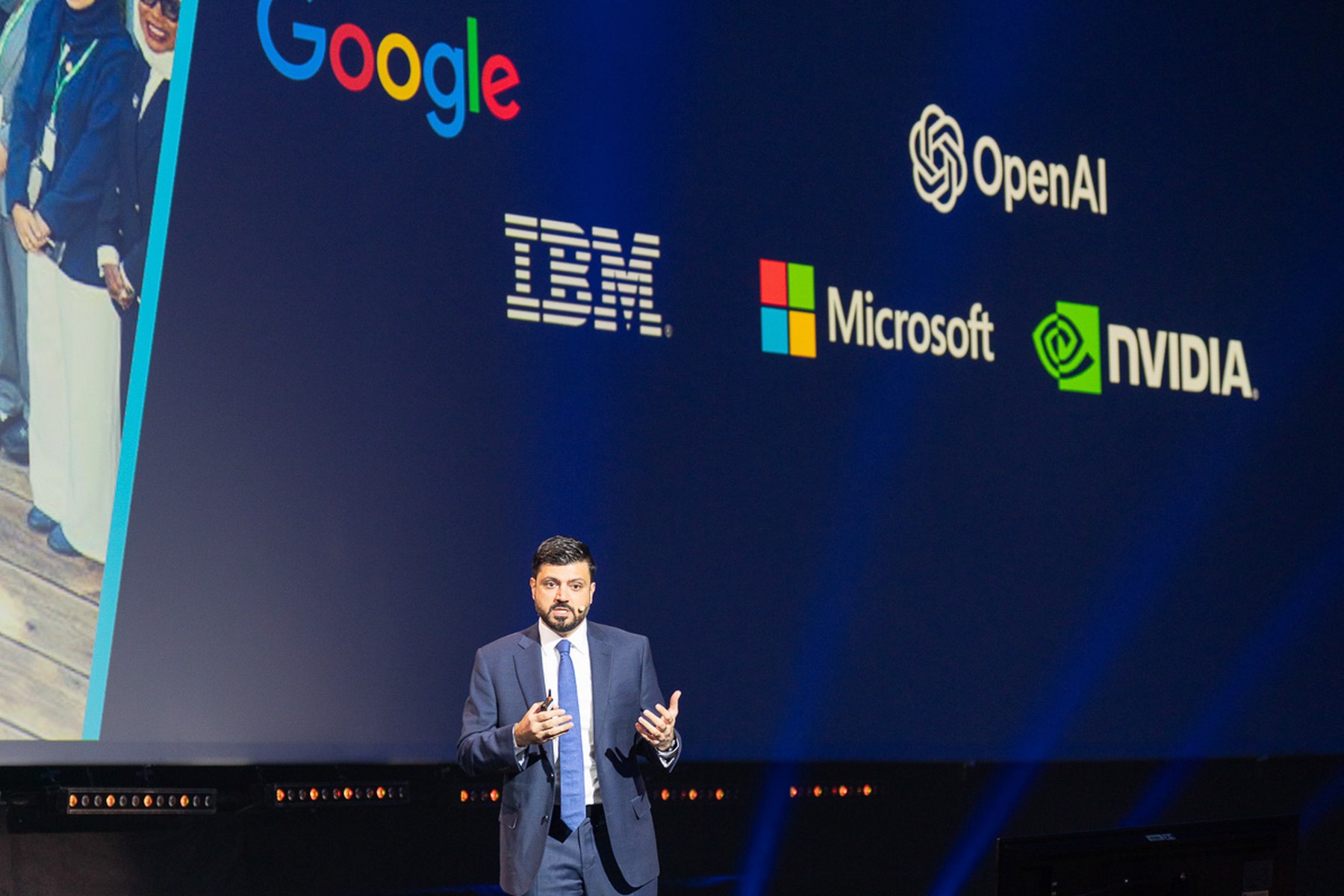 His Excellency Mohamed Bin Taliah on stage at an international AI conference at the Palais des congrès