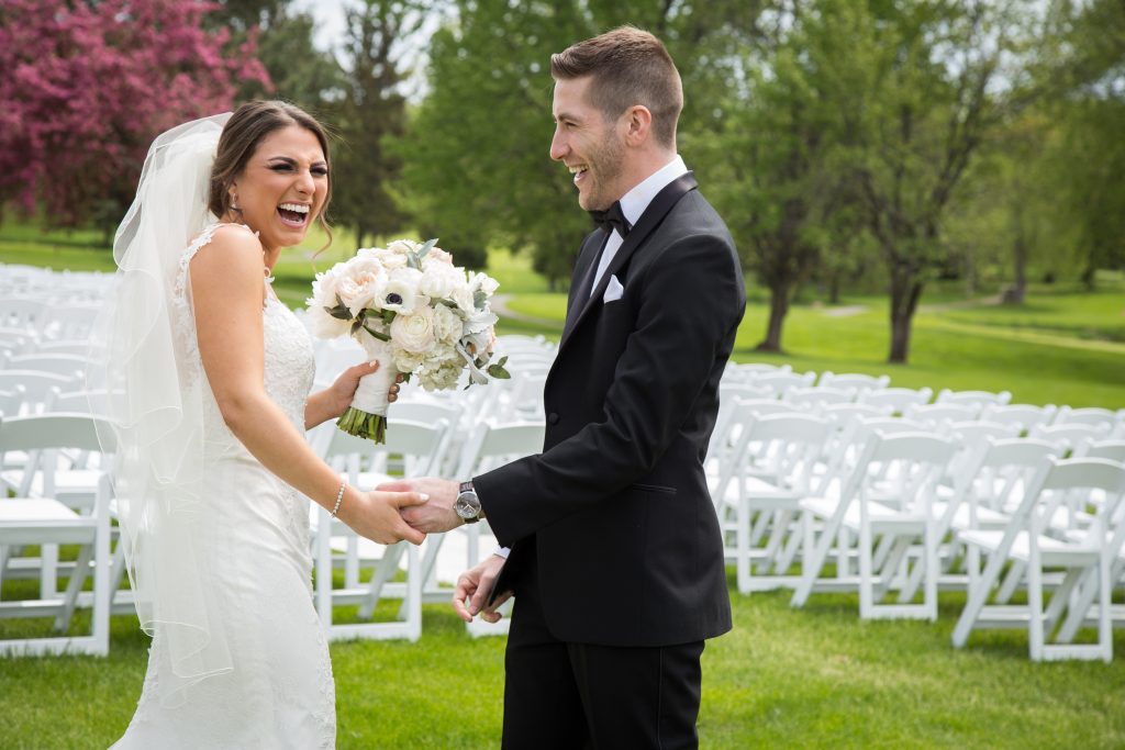 bride and groom first look outside at Elmridge Golf course