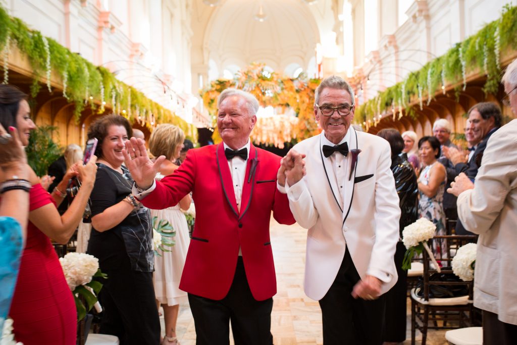 groom and groom just married hand in hand