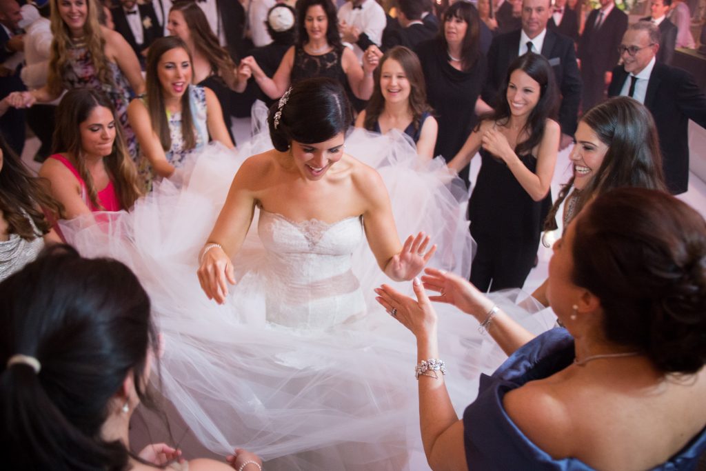 Wedding Photography Montreal: Christina Esteban Photography bride dancing with bridesmaids